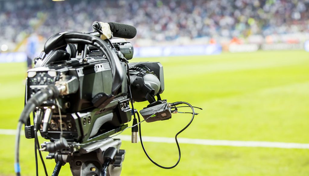 Sports broadcast camera illustrating the difference between Club TV and network coverage.